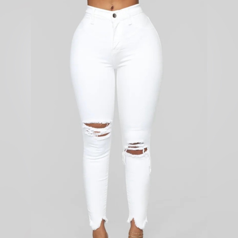 White high waist skinny jeans with rips and ripped ankle cut